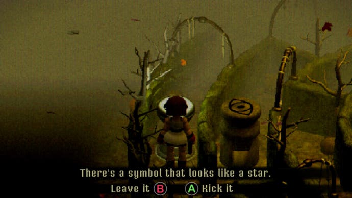 Mara's standing in a creepy maze, a tall stone-like plinth in front of her. It says: "There's a symbol that looks like a star. Press B to Leave it. Press A to Kick It".